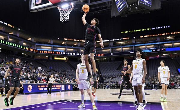Chatsworth High School basketball player Alijah Arenas goes up for a dunk against Monterey in a boys CIF State Division IV championship basketball game in Sacramento, Saturday, March 9, 2024. (Keith Birmingham/The Orange County Register via AP)