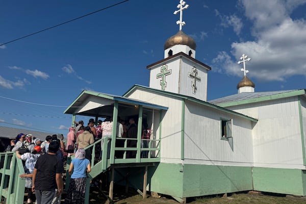 Worshippers wait in long lines to view the remains of St. Olga following her canonization in her hometown of Kwethluk, Alaska, on June 19, 2025. The ceremony drew hundreds of faithful, including from nearby villages and across the world. (AP Photo/Mark Thiessen)