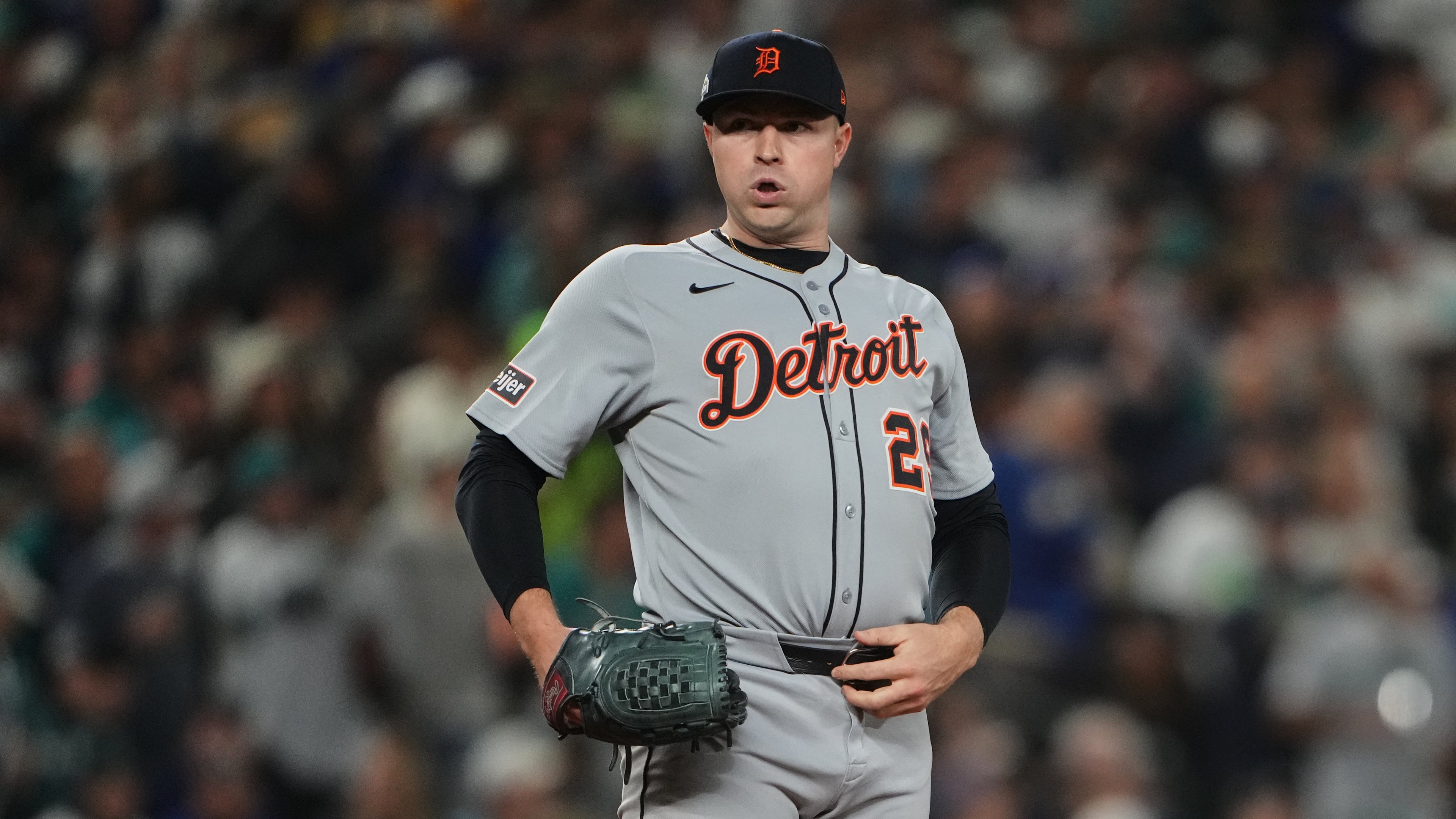 Detroit Tigers starting pitcher Tarik Skubal reacts after giving up a single to Seattle Mariners designated hitter Mitch Garver during the seventh inning in Game 2 of baseball's American League Division Series, Sunday, Oct. 5, 2025, in Seattle. (AP Photo/Lindsey Wasson)