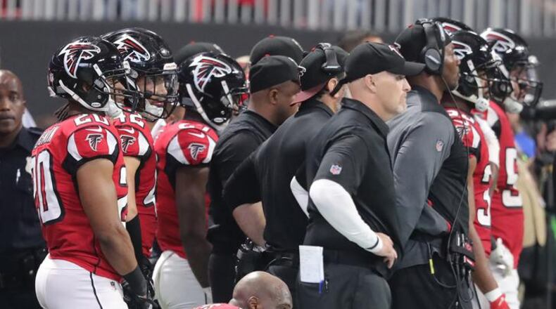 Falcons head coach Dan Quinn can only watch from the sidelines as the Vikings run out the clock for a 14-9 victory over the Falcons in a NFL football game on Sunday, December 3, 2017, in Atlanta. Curtis Compton/ccompton@ajc.com