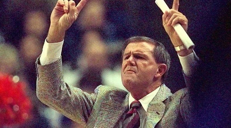 Louisville coach Denny Crum yells instructions to his players during the second half of their game against Kentucky Saturday, Dec. 27, 1997, in Lexington, Ky. Louisville upset No. 4 Kentucky 79-76.