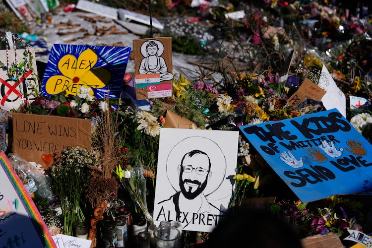 A drawing of Alex Pretti is displayed at the scene where 37-year-old Pretti was fatally shot by a U.S. Border Patrol officer over the weekend, Tuesday, Jan. 27, 2026, in Minneapolis. (Julia Demaree Nikhinson/AP)