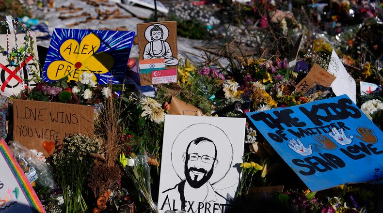 A drawing of Alex Pretti is displayed at the scene where 37-year-old Pretti was fatally shot by a U.S. Border Patrol officer over the weekend, Tuesday, Jan. 27, 2026, in Minneapolis. (Julia Demaree Nikhinson/AP)