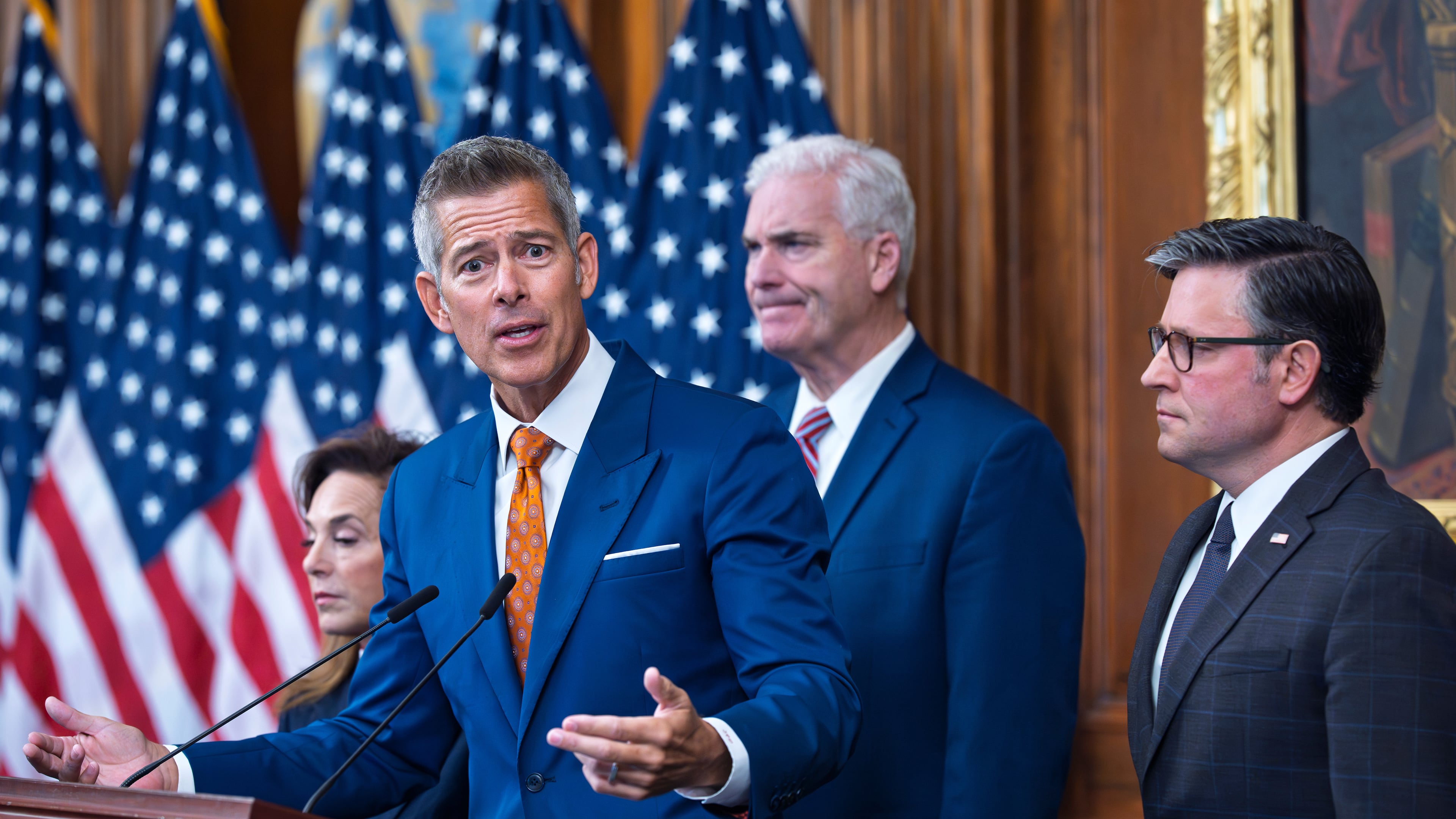 Transportation Secretary Sean Duffy speaks to reporters on day 23 of the government shutdown as he is joined by, from left, Rep. Lisa McClain, R-Mich., House Majority Whip Tom Emmer, R-Minn., and Speaker of the House Mike Johnson, R-La., at a news conference at the Capitol in Washington, Thursday, Oct. 23, 2025. (AP Photo/J. Scott Applewhite)