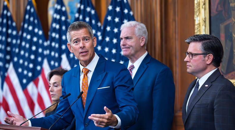 Transportation Secretary Sean Duffy speaks to reporters on day 23 of the government shutdown as he is joined by, from left, Rep. Lisa McClain, R-Mich., House Majority Whip Tom Emmer, R-Minn., and Speaker of the House Mike Johnson, R-La., at a news conference at the Capitol in Washington, Thursday, Oct. 23, 2025. (AP Photo/J. Scott Applewhite)