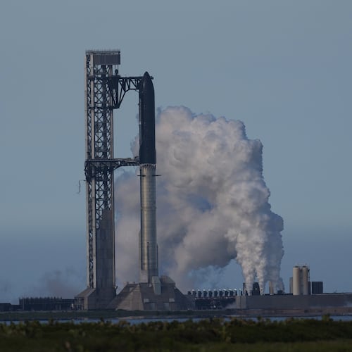 SpaceX's mega rocket Starship is prepared for a test flight that was later delayed, in Starbase, Texas, Thursday, May 21, 2026. (AP Photo/Eric Gay)