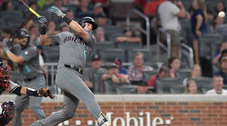 Diamondbacks David Peralta (6) hits the ball in their game against the Atlanta Braves in an MLB baseball game at SunTrust Park on Friday, July 13, 2018, in Atlanta. Jenna Eason / Jenna.Eason@coxinc.com
