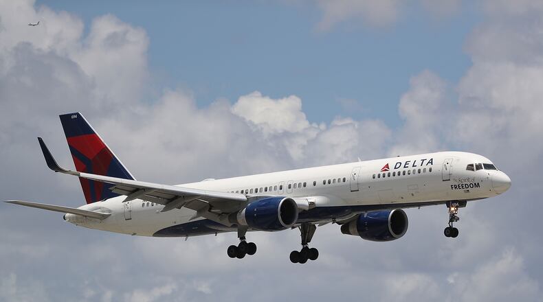FORT LAUDERDALE, FL - JULY 14: A Delta airlines plane is seen as it comes in for a landing at the Fort Lauderdale-Hollywood International Airport on July 14, 2016 in Fort Lauderdale, Florida. Delta Air Lines Inc. reported that their second quarter earnings rose a better-than-expected 4.1%, and also announced that they decided to reduce its United States to Britian capacity on its winter schedule because of foreign currency issues and the economic uncertainty from Brexit. (Photo by Joe Raedle/Getty Images)