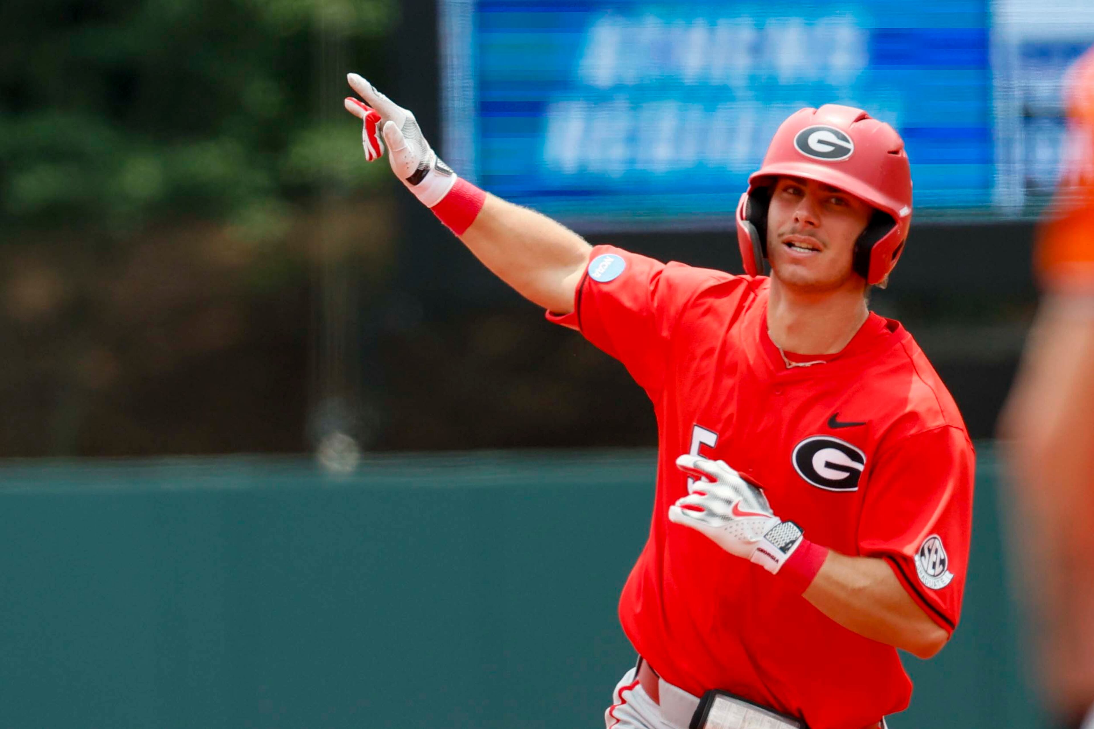 Georgia infielder Christian Adams (5) reacts after hitting a two-run home run during the second inning against Oklahoma State in their NCAA Regional game at Foley Field,  Sunday, June 1, 2025, in Athens, Ga.
(Miguel Martinez/ AJC)