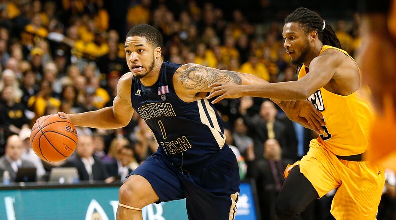 Georgia Tech’s Tadric Jackson (1) fights off Virginia Commonwealth’s Doug Brooks (5) as he moves the ball during the second half of an NCAA college basketball game in Richmond, Va., Wednesday, Dec. 7, 2016. (Mark Gormus/Richmond Times-Dispatch via AP)