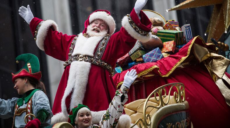 You’ll be seeing this guy a lot over the next few months. Santa Claus waves to the crowd during the Macy’s Thanksgiving Day Parade in 2014 in New York City. (Photo by Andrew Burton/Getty Images) *** BESTPIX ***