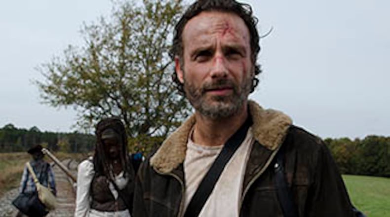 Carl Grimes (Chandler Riggs), Michonne (Danai Gurira) and Rick Grimes (Andrew Lincoln) - The Walking Dead _ Season 4, Episode 15 - Photo Credit: Gene Page/AMC Carl Grimes (Chandler Riggs), Michonne (Danai Gurira) and Rick Grimes (Andrew Lincoln) - The Walking Dead _ Season 4, Episode 15 - Photo Credit: Gene Page/AMC