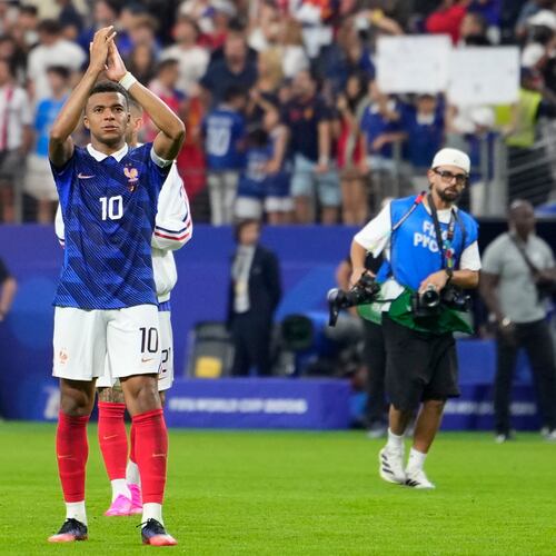 France's Kylian Mbappe (10) applauds after the World Cup semifinal soccer match between France and Spain in Arlington, Texas, near Dallas, Tuesday, July 14, 2026. (AP Photo/Tony Gutierrez)