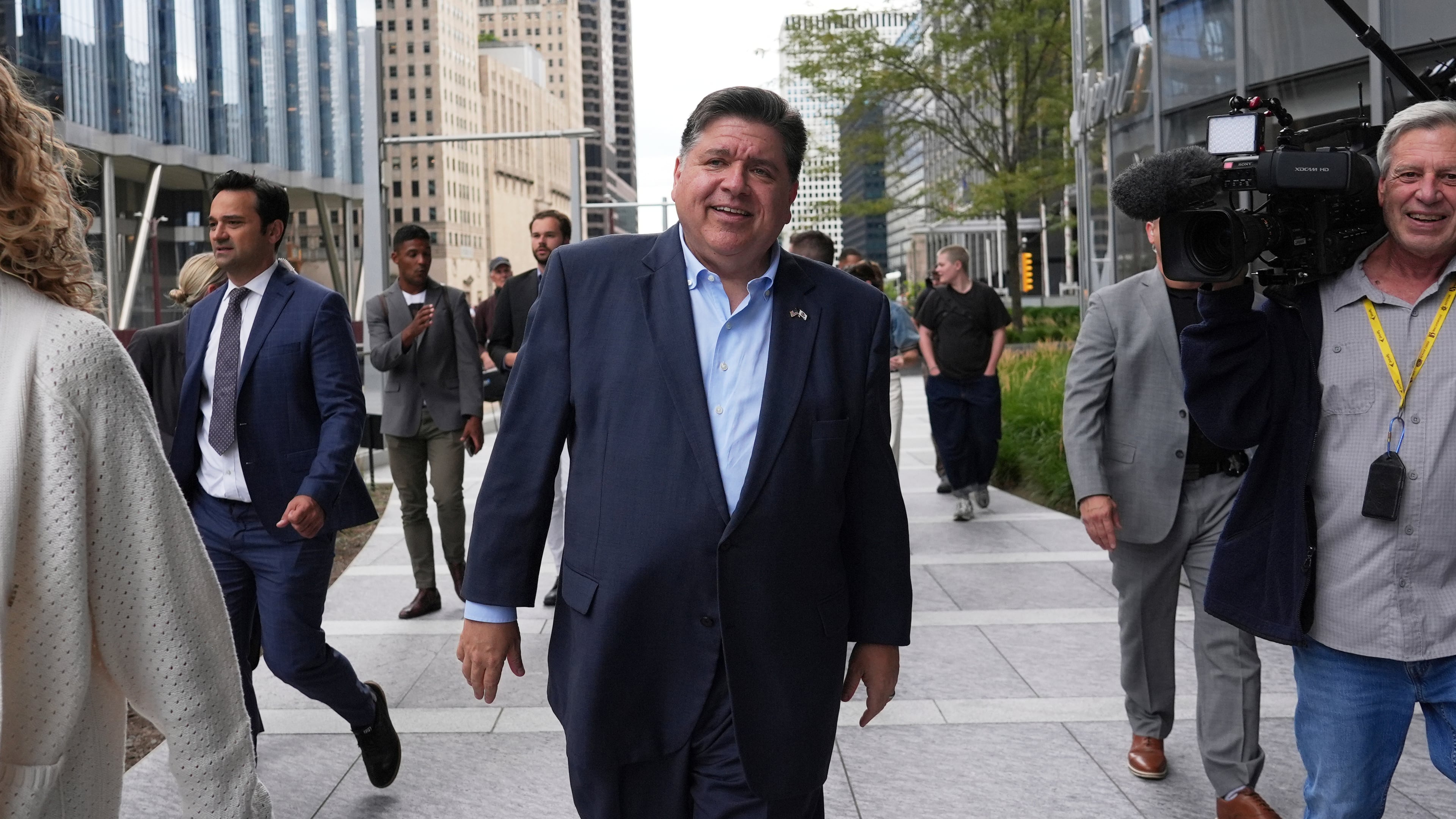 FILE - Illinois Governor JB Pritzker walks to River Point Park for a news conference, Aug. 25, 2025, in Chicago. (AP Photo/Nam Y. Huh, File)