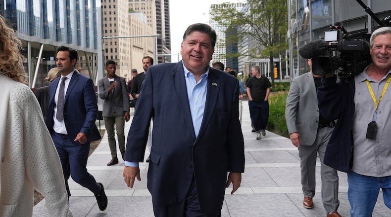 FILE - Illinois Governor JB Pritzker walks to River Point Park for a news conference, Aug. 25, 2025, in Chicago. (AP Photo/Nam Y. Huh, File)