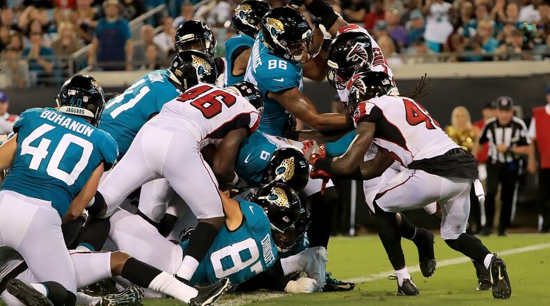 JACKSONVILLE, FL - AUGUST 25:  Cody Kessler #6 of the Jacksonville Jaguars crosses the goal line for a touchdown during a preseason game against the Atlanta Falcons at TIAA Bank Field on August 25, 2018 in Jacksonville, Florida.  (Photo by Sam Greenwood/Getty Images)