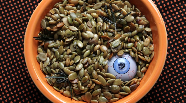 You can substitute pumpkin seeds left over from carving your jack-o'-lantern, but be sure to provide a place for guests to discard the pumpkin seed hulls.