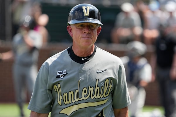 FILE - Vanderbilt head coach Tim Corbin walks on the field during an NCAA regional college tournament baseball game against Xavier, June 4, 2023, in Nashville, Tenn. (AP Photo/Mark Humphrey, File)