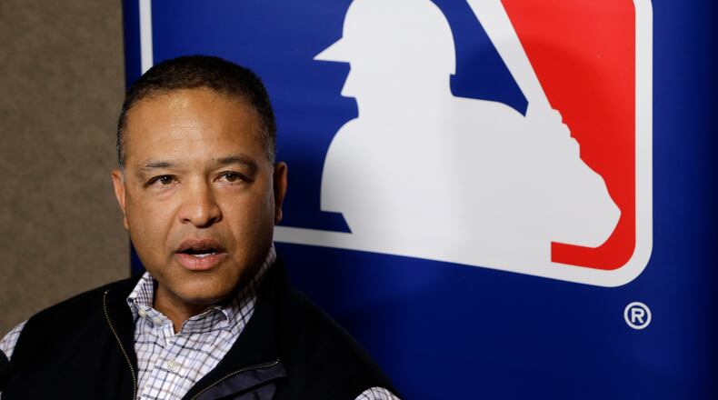 Los Angeles Dodgers manager Dave Roberts talks with reporters at the Major League Baseball winter meetings Monday, Dec. 7, 2015, in Nashville, Tenn. (AP Photo/Mark Humphrey)