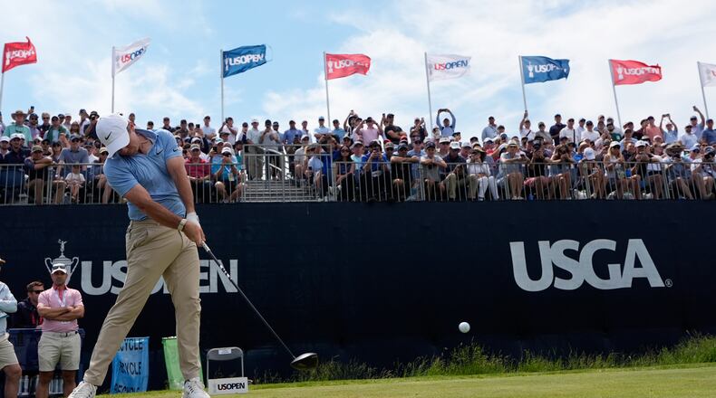 Rory McIlroy, of Northern Ireland, hits his tee shot on the 12th hole during a practice round for the U.S. Open golf tournament at Shinnecock Hills Golf Club in Southampton, N.Y., Wednesday, June 17, 2026.(AP Photo/David J. Phillip)