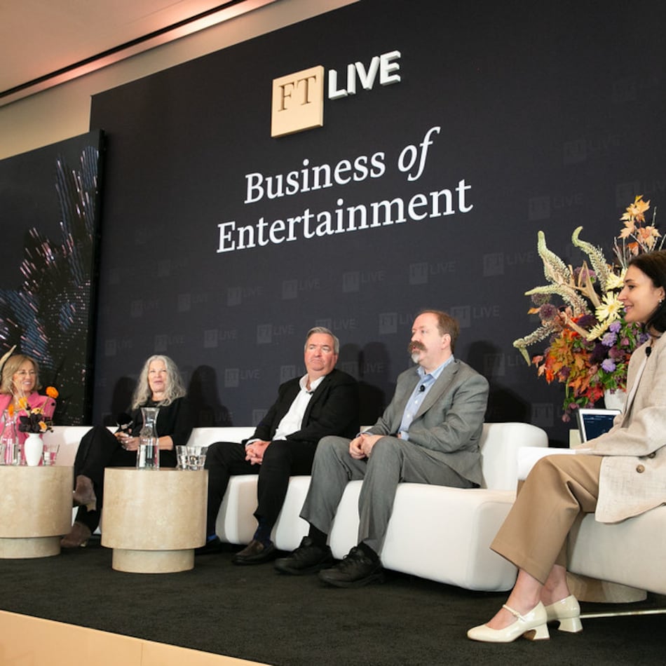 Industry leaders Dee Dee Myers (far left), Rebecca Rhine, the Western Executive Director of the Directors Guild of America, Paul Poteet, a partner with FGS Global and Kevin Klowden, the executive director of the Milken Institute, speak on a panel part of the Financial Times' Business of Entertainment Summit. (Courtesy of Hal Horowitz Photography)