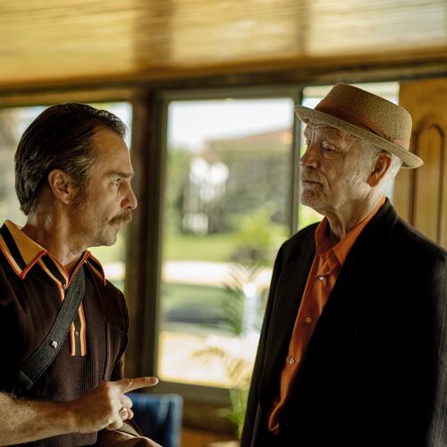 This image released by Searchlight Pictures shows Sam Rockwell, left, and John Malkovich in a scene from "Wild Horse Nine." (Diego Araya Corvalán/Searchlight Pictures via AP)