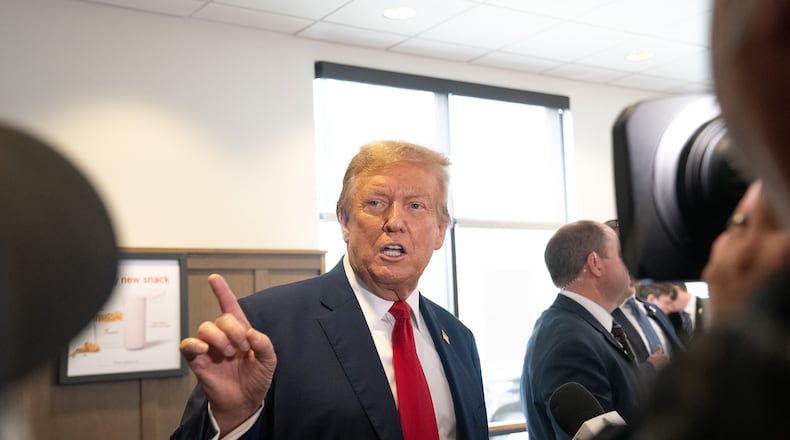 Former president Donald Trump speaks to the media on April 10 at a Chick-fil-A restaurant in Atlanta. (Megan Varner/Getty Images/TNS)