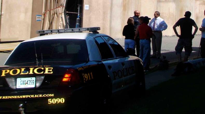 "The Walking Dead" is replicating 2009 CBS reality show "There Goes the Neighborhood" (shown above) by building a 15-foot wall around several homes. CREDIT: Rodney Ho