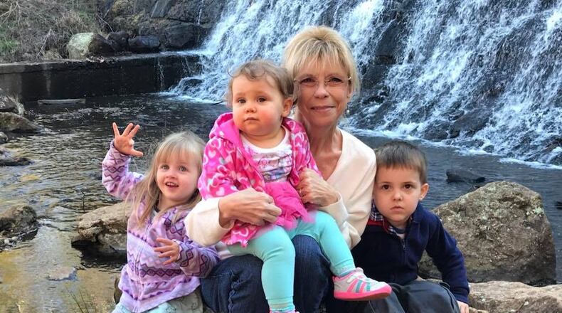 Holly Rogers with grandchildren Taylor, Abigail and PJ Jr.  Family photo