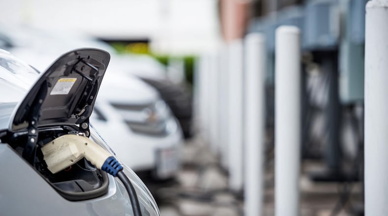 CBRE is partnering with EV+ to install 10,000 electric vehicle charging stations at public places across the country. Courtesy of CBRE