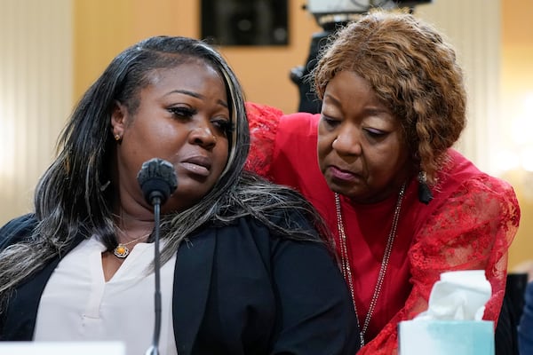 FILE - Wandrea "Shaye" Moss, a former Georgia election worker, is comforted by her mother Ruby Freeman, right, at the House select committee investigating the Jan. 6 attack on the U.S. Capitol. (AP Photo/Jacquelyn Martin, File)