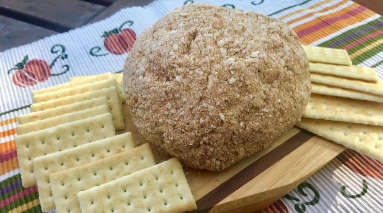 For a retro-style treat, bring out an Apple Pie Cheese Ball with butter crackers. LIGAYA FIGUERAS / LFIGUERAS@AJC.COM