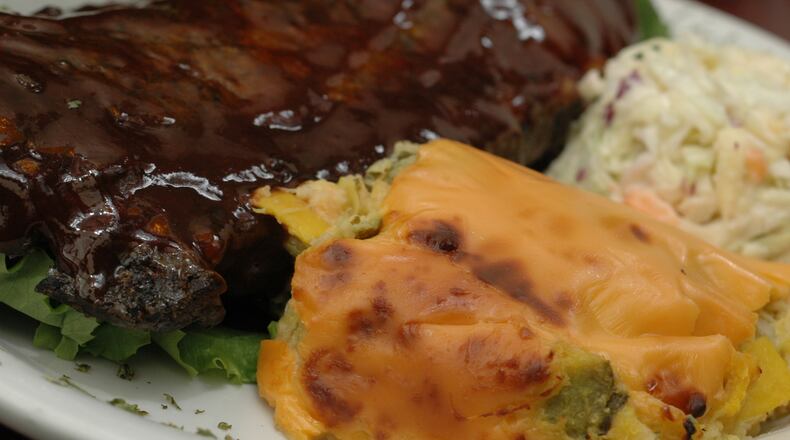 031510-ATLANTA-GA: From the Menu of: THREE DOLLAR CAFE  FOOD:  SQUASH CASSEROLE PICTURED WITH BBQ RIBS & COLE SLAW STYLED BY:  OWNER & KITCHEN MANAGER, PETER HAM (ADRIENNE HARRIS/special)