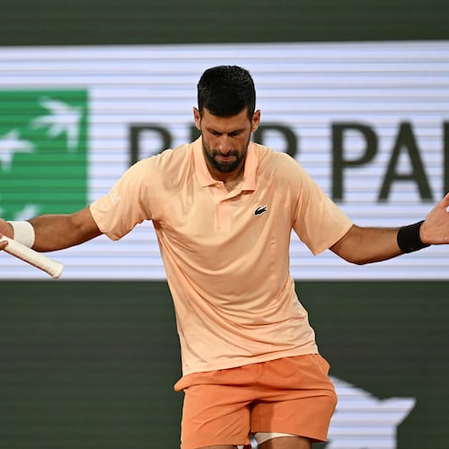 Novak Djokovic of Serbia celebrates after winning the first round men's singles tennis match against against Giovanni Mpetshi Perricard of France at the French Open tennis tournament in Paris, Sunday, May 24, 2026. (AP Photo/Emma Da Silva)