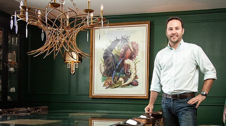 Atlanta designer Chris Socci enjoys making interior spaces feel special. In his own home, he uses brass and gold, bold colors and transitional furniture pieces. Contributed by J. King Photography