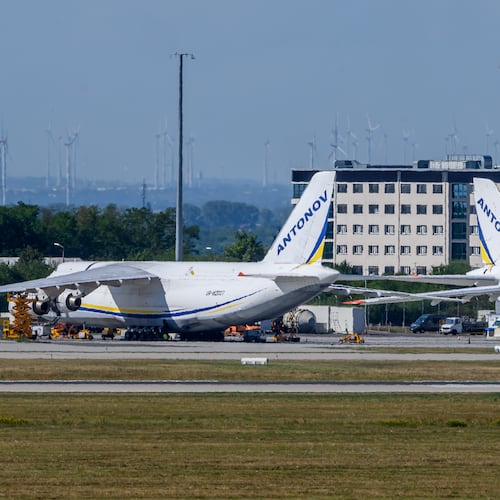 Ukrainian Antonov aircrafts are parked behind a fence on the grounds of Leipzig/Halle Airport, where investigations are underway following the drone incident that occurred early Wednesday morning, in Schkeuditz, Germany, Thursday Aug. 6, 2026. (Hendrik Schmidt/dpa via AP)