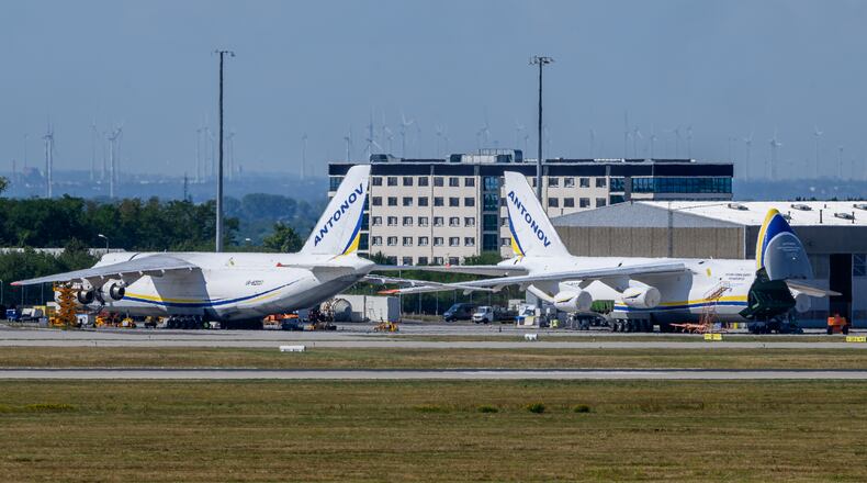 Ukrainian Antonov aircrafts are parked behind a fence on the grounds of Leipzig/Halle Airport, where investigations are underway following the drone incident that occurred early Wednesday morning, in Schkeuditz, Germany, Thursday Aug. 6, 2026. (Hendrik Schmidt/dpa via AP)