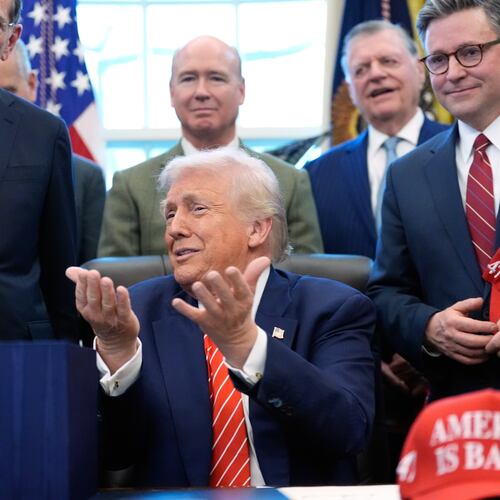 President Donald Trump speaks to reporters after signing a spending bill that ends a partial shutdown of the federal government in the Oval Office of the White House, Tuesday, Feb. 3, 2026, in Washington. (AP Photo/Alex Brandon)