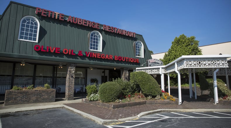 Petite Auberge, a French restaurant, is one of the longtime tenants no longer in the Toco Hill Shopping Center. CONTRIBUTED BY MICHIE TURPIN PHOTOGRAPHY