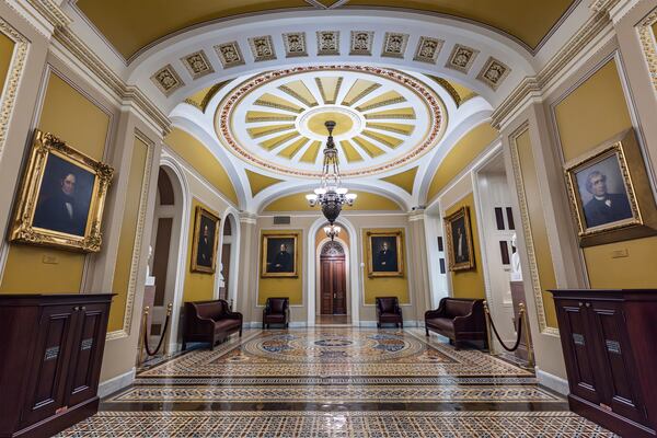 The ornate corridor outside the Senate chamber is seen as Senate Republicans work to pass President Donald Trump's bill of tax breaks and spending cuts by his July Fourth deadline, in Washington, Sunday, June 29, 2025. (AP Photo/J. Scott Applewhite)