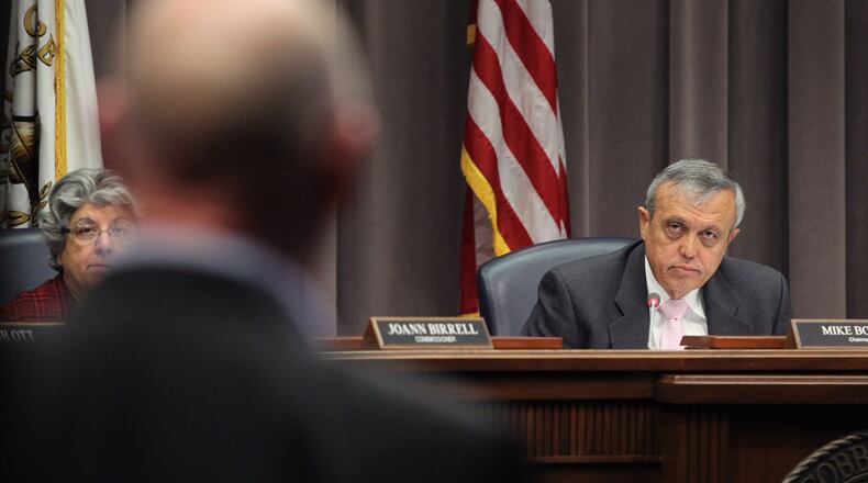 Mike Boyce, chairman of the Cobb County Commission, listens to a speaker in Marietta on Jan. 24, 2017. (HENRY TAYLOR / HENRY.TAYLOR@AJC.COM)