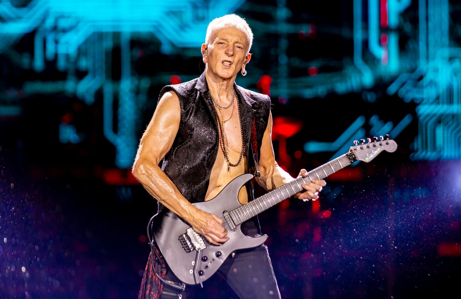 Def Leppard rocks the crowd with all the hits spanning their 48 year career at Truist Park in Atlanta on Saturday, July 13, 2024. (RYAN FLEISHER FOR THE ATLANTA JOURNAL-CONSTITUTION)