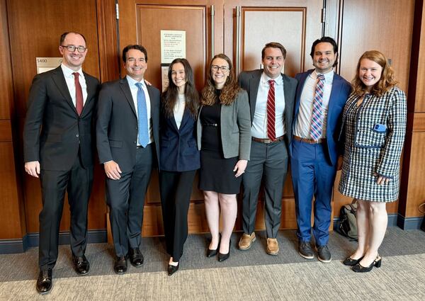Nicole Boynton's volunteer legal team, (L-R) Alston & Bird lawyers Peter Cornick, Joey Burby, Leila Knox, Erin Edwards, Heeth Varnedoe and Asher Quesenberry, and Ellie Williams, legal director of the Justice for Incarcerated Survivors Program run by the Georgia Coalition Against Domestic Violence. (Courtesy of Alston & Bird)