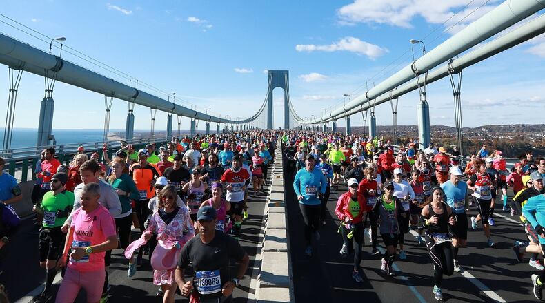 Running a marathon — such as this one in New York City last November — is a fine endeavor, but sometimes we focus too much on physical health and not enough on traits like being humble and kind, columnist Lorraine Murray says. MICHAEL REAVES / GETTY IMAGES
