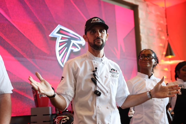 Senior Executive Chef Matt Cooper presents new food and beverage options at Mercedes-Benz Stadium in Atlanta on Sept. 15, 2026, ahead of the Falcons home opener. (Arvin Temkar/AJC)