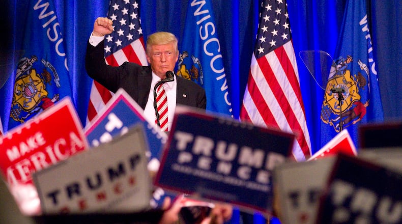 Republican presidential nominee Donald Trump concludes his speech at his campaign rally Tuesday, Aug. 16, 2016 in West Bend, Wis. (John Ehlke/West Bend Daily News via AP)