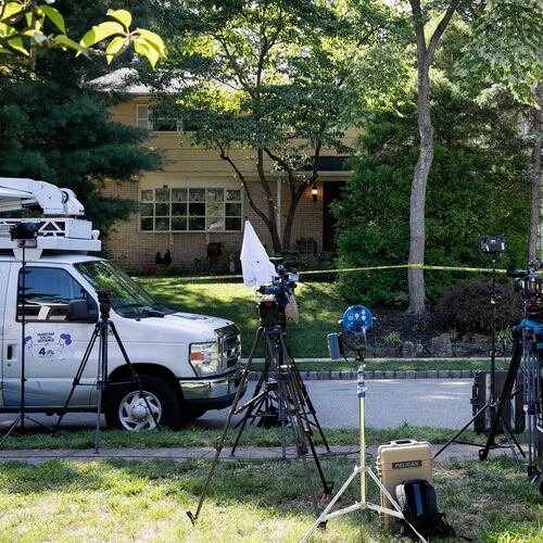 FILE - News media is set up in front of the home of U.S. District Judge Esther Salas in North Brunswick, N.J., on Monday, July 20, 2020, after a gunman posing as a delivery person shot and killed Salas' 20-year-old son and wounded her husband Sunday evening. (AP Photo/Mark Lennihan, File)
