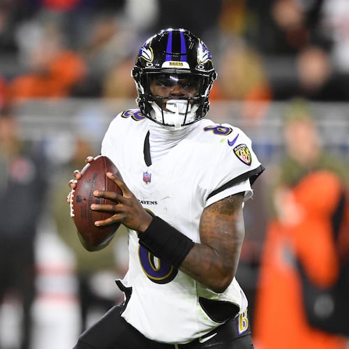 Baltimore Ravens quarterback Lamar Jackson (8) rolls out of the pocket in the second half of an NFL football game against the Cleveland Browns in Cleveland, Sunday, Nov. 16, 2025. (AP Photo/David Richard)