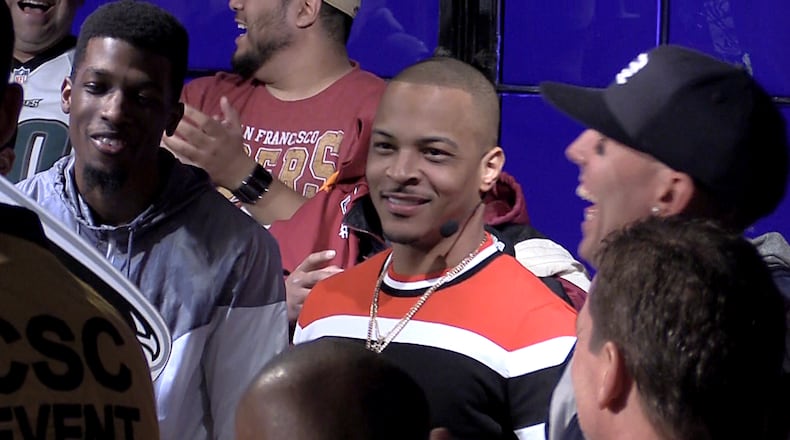T.I. makes his way to the ESPN set during the Atlanta Falcons' Super Bowl run in 2017. Photo: Ryon Horne/AJC