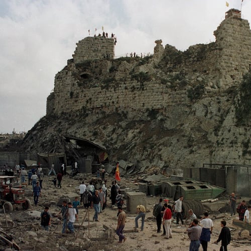 FILE -Villagers inspect the damage to Beaufort Castle, 10 kilometers (6 miles) northwest of the southern market town of Nabatiyeh, Lebanon, Wednesday, May 24, 2000. (AP Photo/Ahmed Mantash, File)